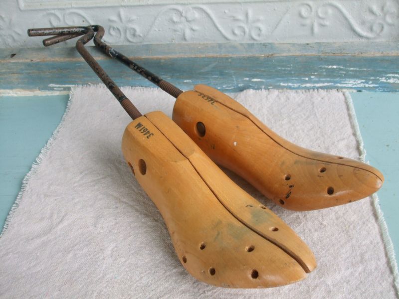 A pair of vintage shoe forms.